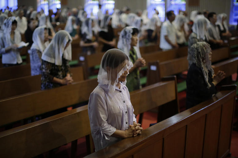 AP Photo/Eugene Hoshiko