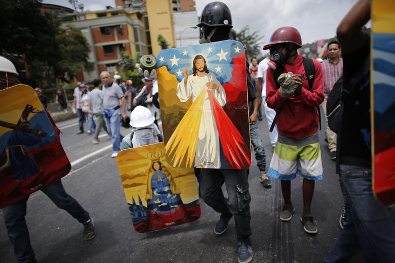 AP Photo/Ariana Cubillos