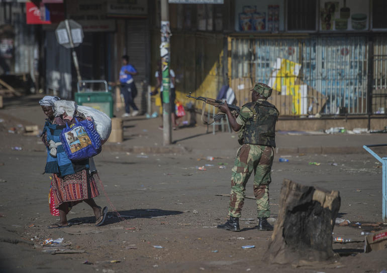 AP Photo/Mujahid Safodien