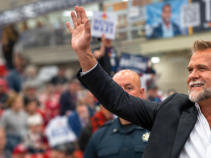 Bearded Politician Waving to Crowd.png