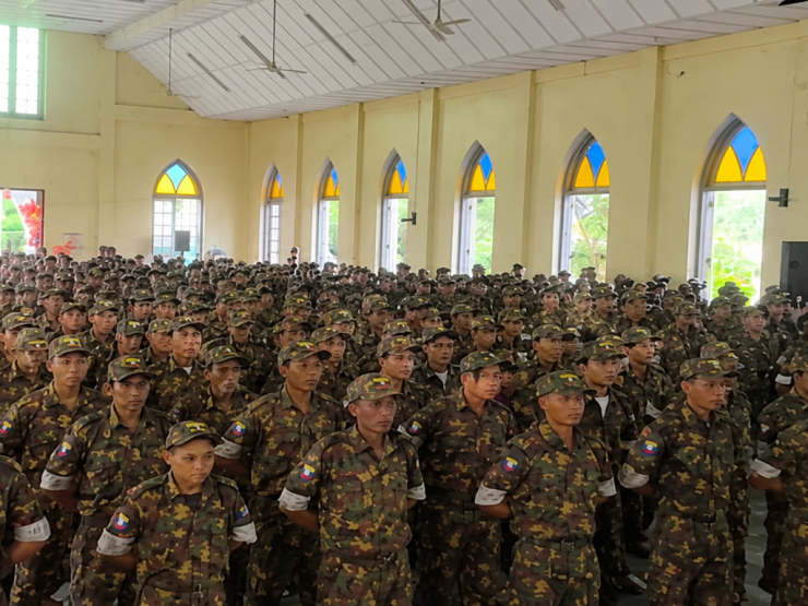 Crowded Military Assembly Hall.png