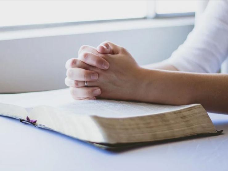 praying bible.JPG