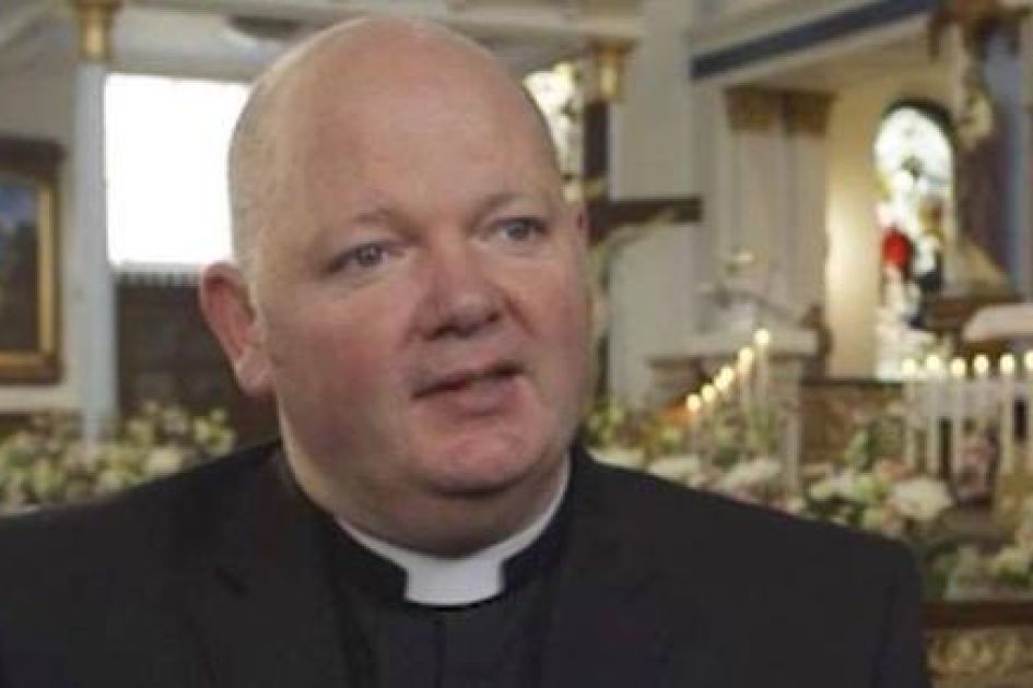 Suspect charged following spitting attack on priest