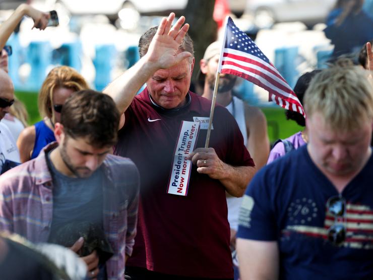 Trump supporters praying.JPG