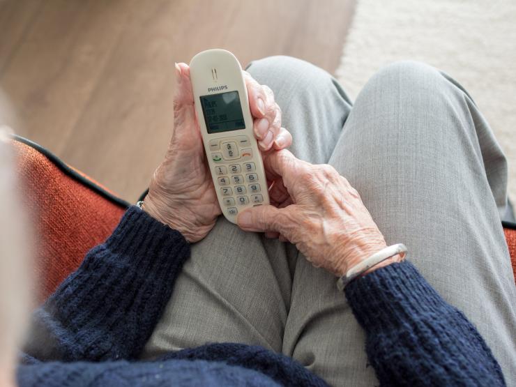 old person using phone.jpg
