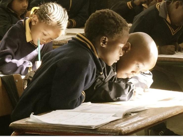 kids in clasroom.JPG