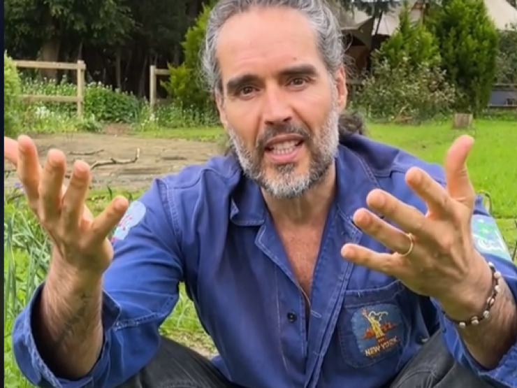 Russell Brand gets baptised 3.png