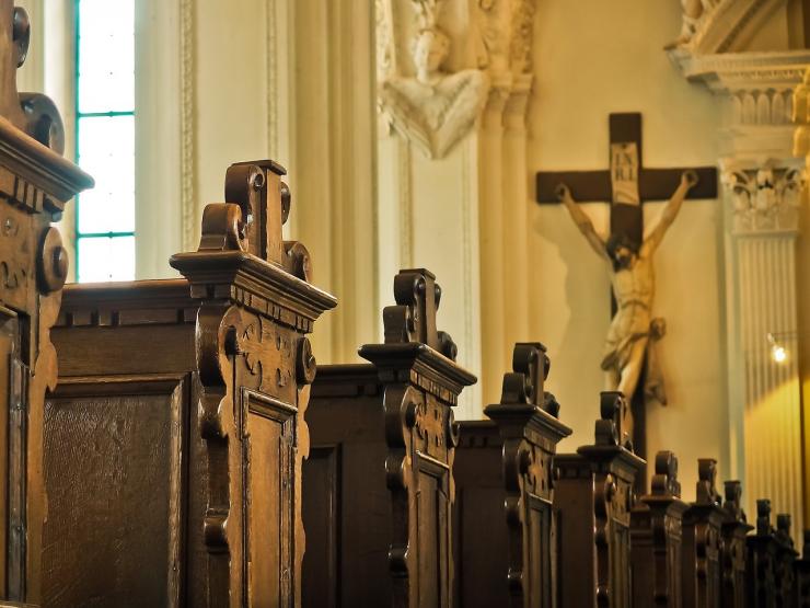 catholic church pews cross.jpg