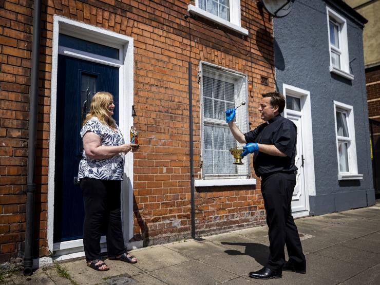 holy water doorstep blessing belfast.jpg