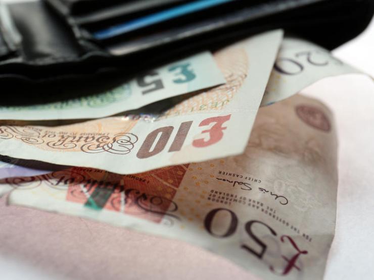 money-cash-in-wallet-thumb_galleryfull.jpg