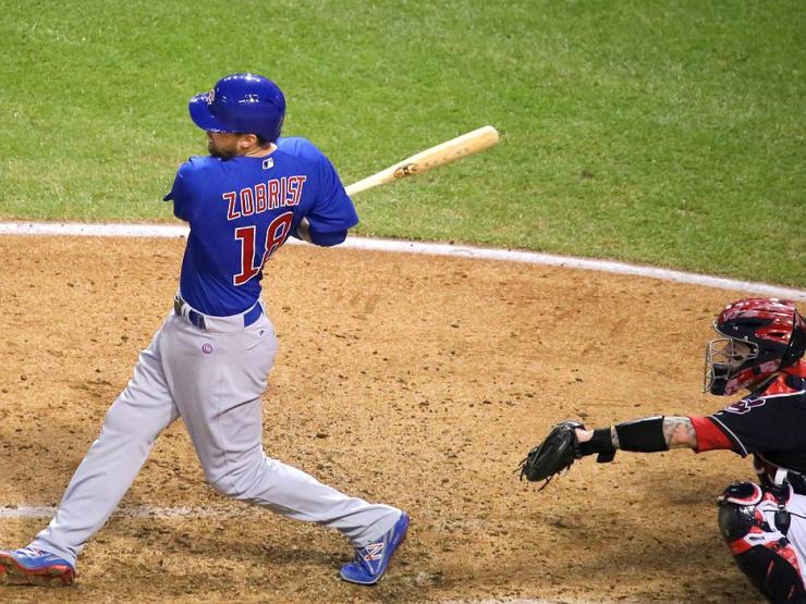 Cubs_outfielder_Ben_Zobrist_swings_at_a_pitch_during_World_Series_Game_7._(30108530553).jpg