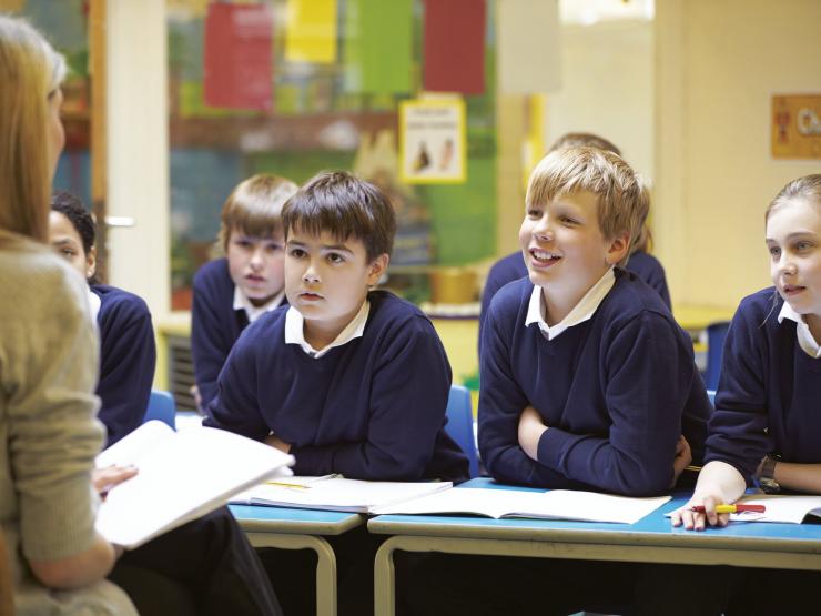Teacher children classroom Religious Education.jpg