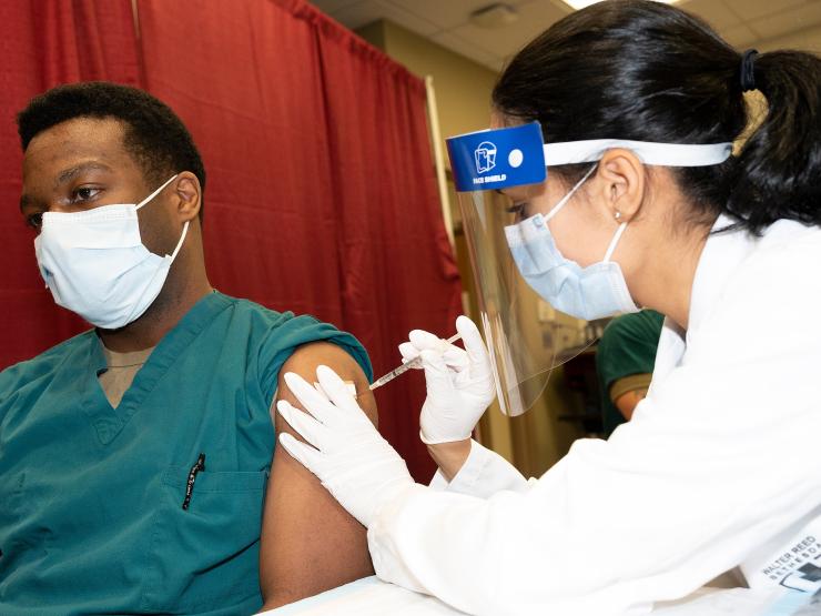 COVID-19_vaccination_(2020).jpg