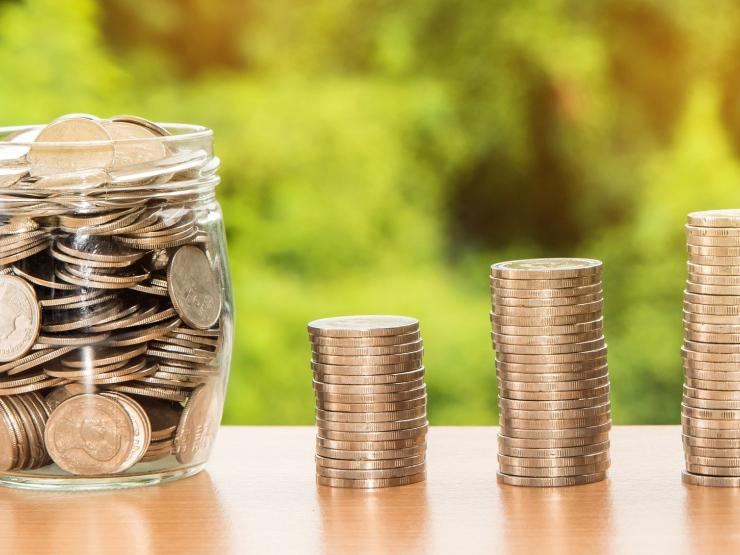 Pot and pile of coins cash money and Image by Nattanan Kanchanaprat from Pixabay.jpg
