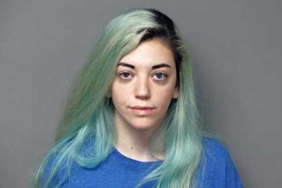 Woman charged after allegedly setting fire to cross in church