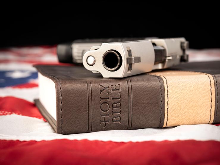 gun on bible.jpg