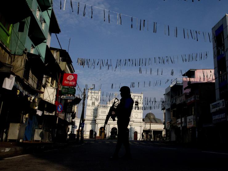 Sri Lanka attacks guard outside shrine credit AP Photo and Gemunu Amarasinghe.jpg