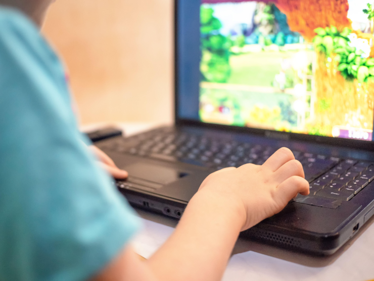 Child on laptop rotated.jpg
