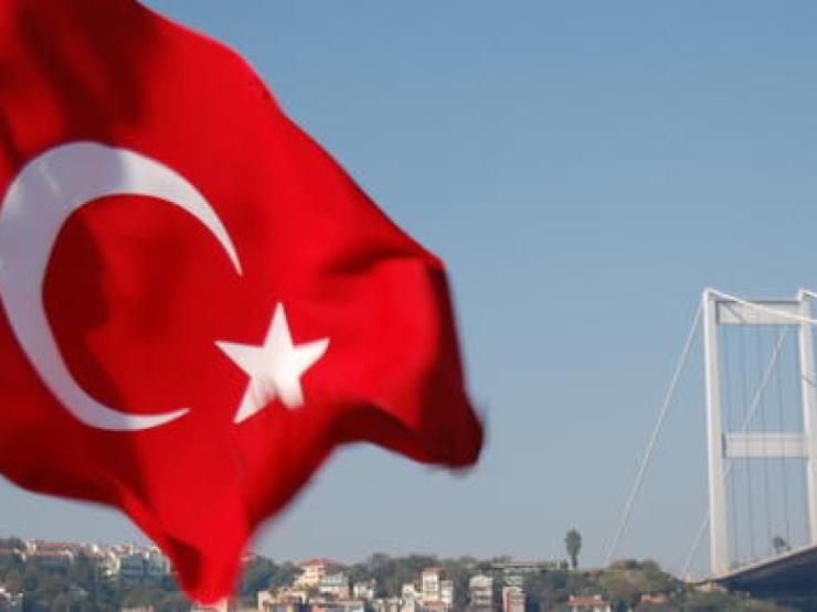 Turkey-flag-with-birdge-in-background-main_article_image.jpg