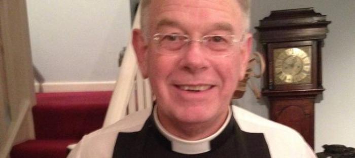 Church of England priest banned after marrying male partner picture